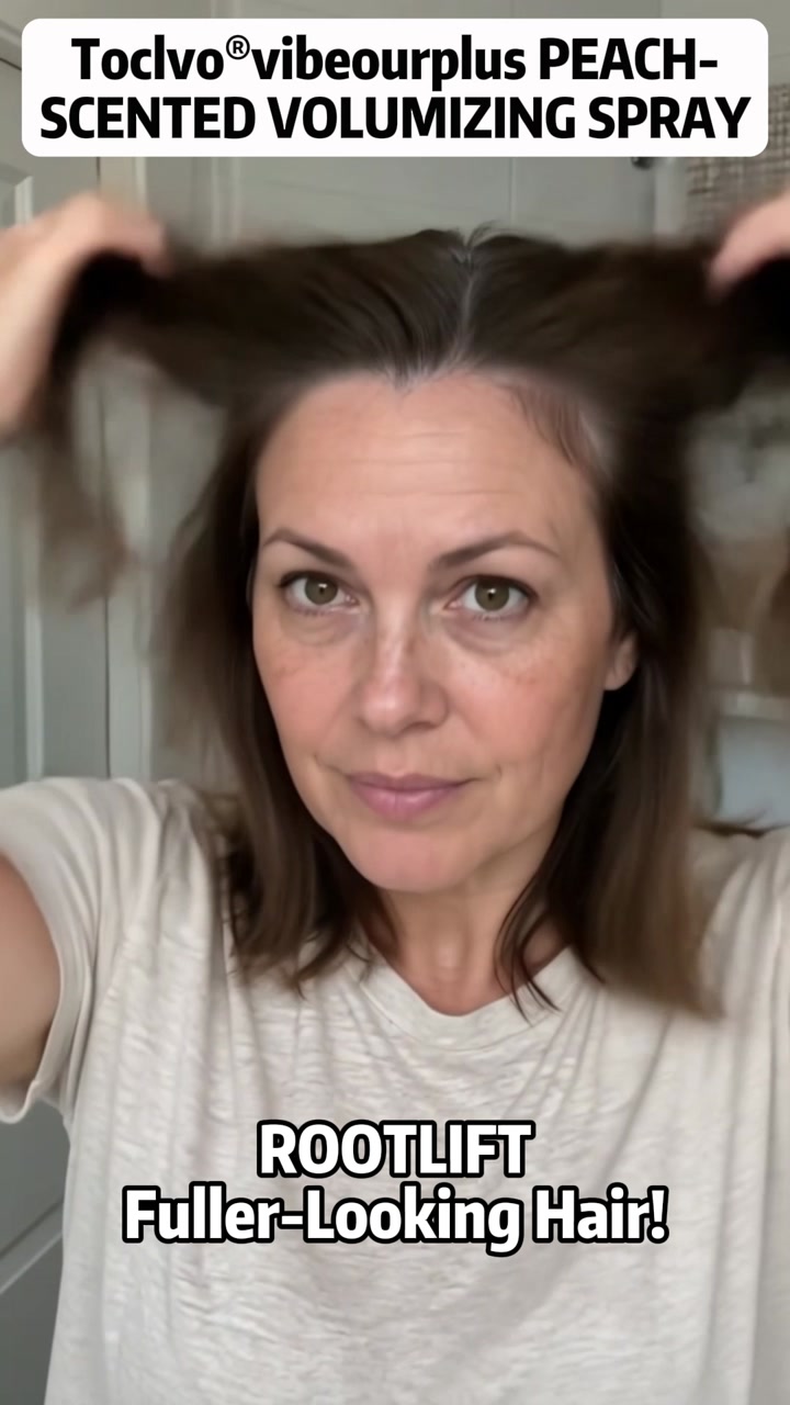 Using fingers to lift the hair at the roots